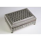 Indian Micro Mosaic decorated Box raised on four brass bun feet, 23cm long x 9cm high