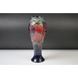 Moorcroft Pottery ' Pomegranate and Finches ' pattern vase of tapering baluster form, WM initials to