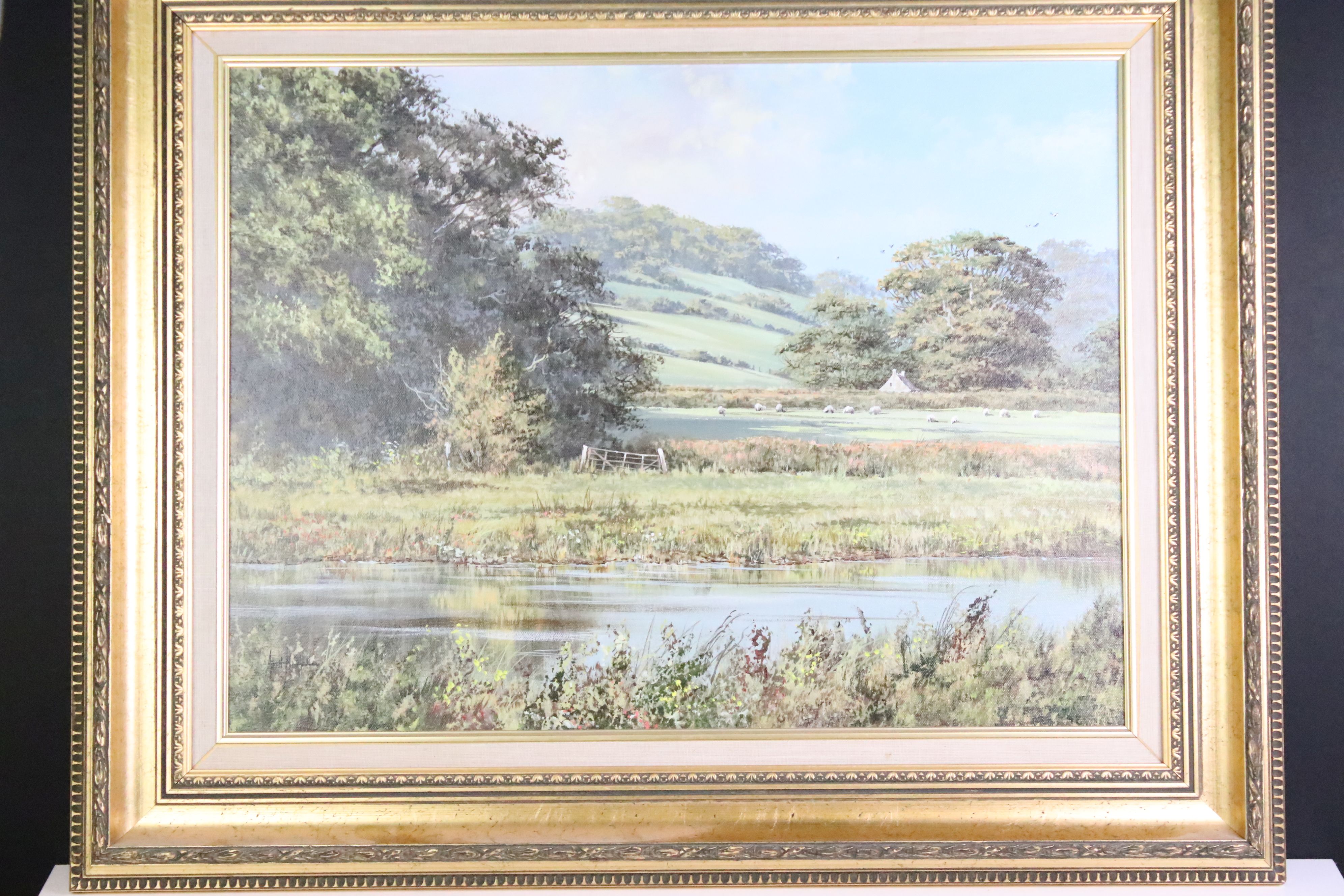 20th Century Oil on Canvas of a Rural River Scene, signed to lower left, gilt framed. Measures