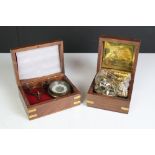 A contemporary wooden cased compass and sextant.