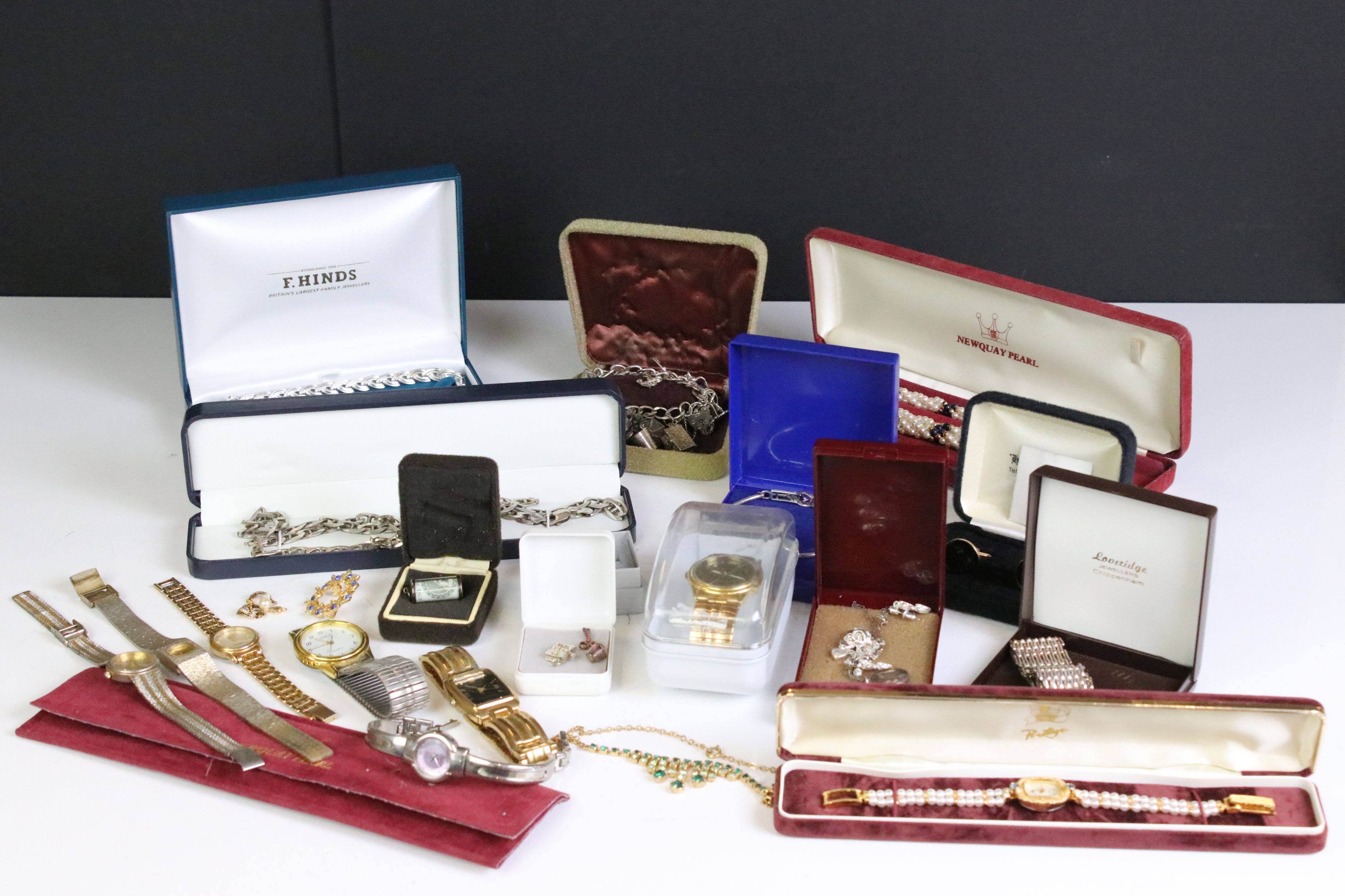 A collection of mainly vintage jewellery to include silver examples including a silver charm