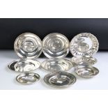 A collection of nine silver plated presentation dishes.