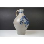 19th Century Salt Glazed Stoneware Flagon of baluster form, decorated with a cobalt blue floral