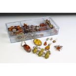 A large collection of mainly 925 sterling silver mounted Amber jewellery to include earrings,