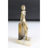 Austrian Art Deco style gilt metal bookend in the form of a nude lady, marked ' Lorenzl ', raised on