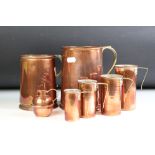 Set of Four Copper Graduating Measures together with Two Copper Tankards, 16cm high and a small Jug