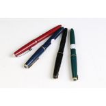 A collection of three vintage Parker fountain pens together with a Platinum example.