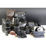 A small collection photographic equipment to include a Chinon 35mm SLR camera, Lenses, filters....