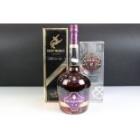 A bottle of Courvoisier V.S. Cognac together with a bottle of Remy Martin V.S.O.P. and a bottle of
