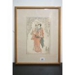 Framed and glazed signed antique Japanese woodblock of a male figure holding a fan