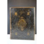 A large antique 19th century family bible with brass fastenings.