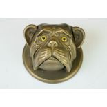 A bronze pug doll bell