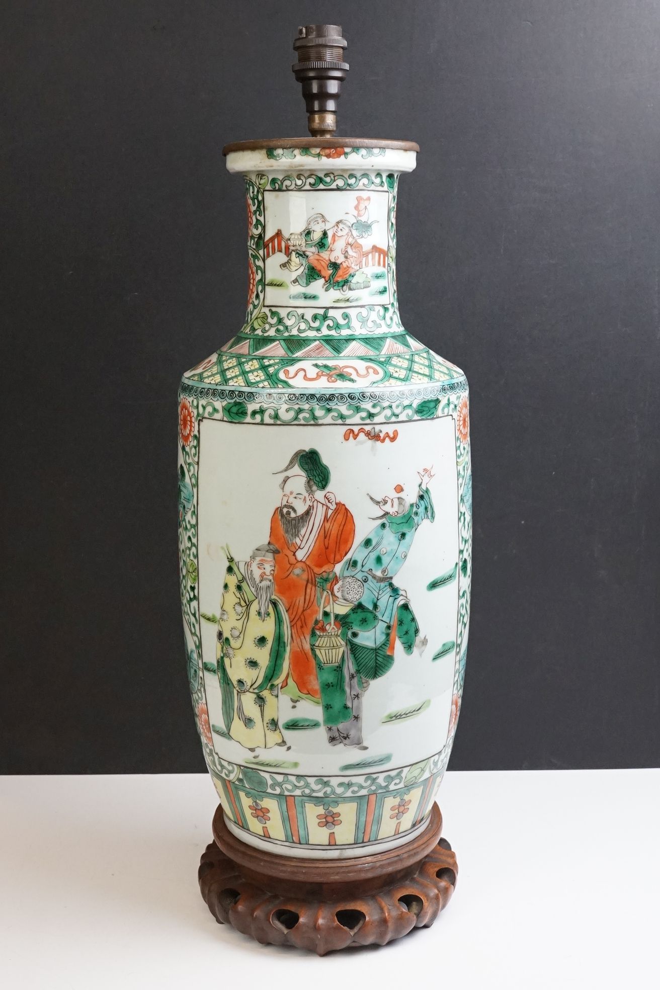 Chinese Porcelain Famille Verte Table Lamp of Rouleau form, decorated with panels of figures, with