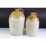 A pair of vintage stoneware bottles to include a Swindon advertising example.