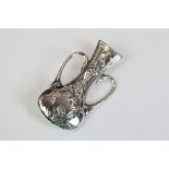Silver posy brooch in the form of a twin handled vase