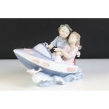 Lladro Porcelain Figure Group titled ' Riding the Waves ' model no. 5941, 16cm high