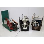Two Amusement / Fairground Wooden Boxes, the double hinged lids housing wooden skeletons that pop-up