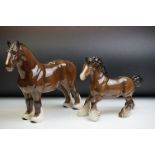 Two Beswick porcelain shire horse figures in brown gloss (tallest measures 26.5cm high)