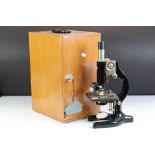 Two vintage microscopes to include a Prior London and a cased Senior example.