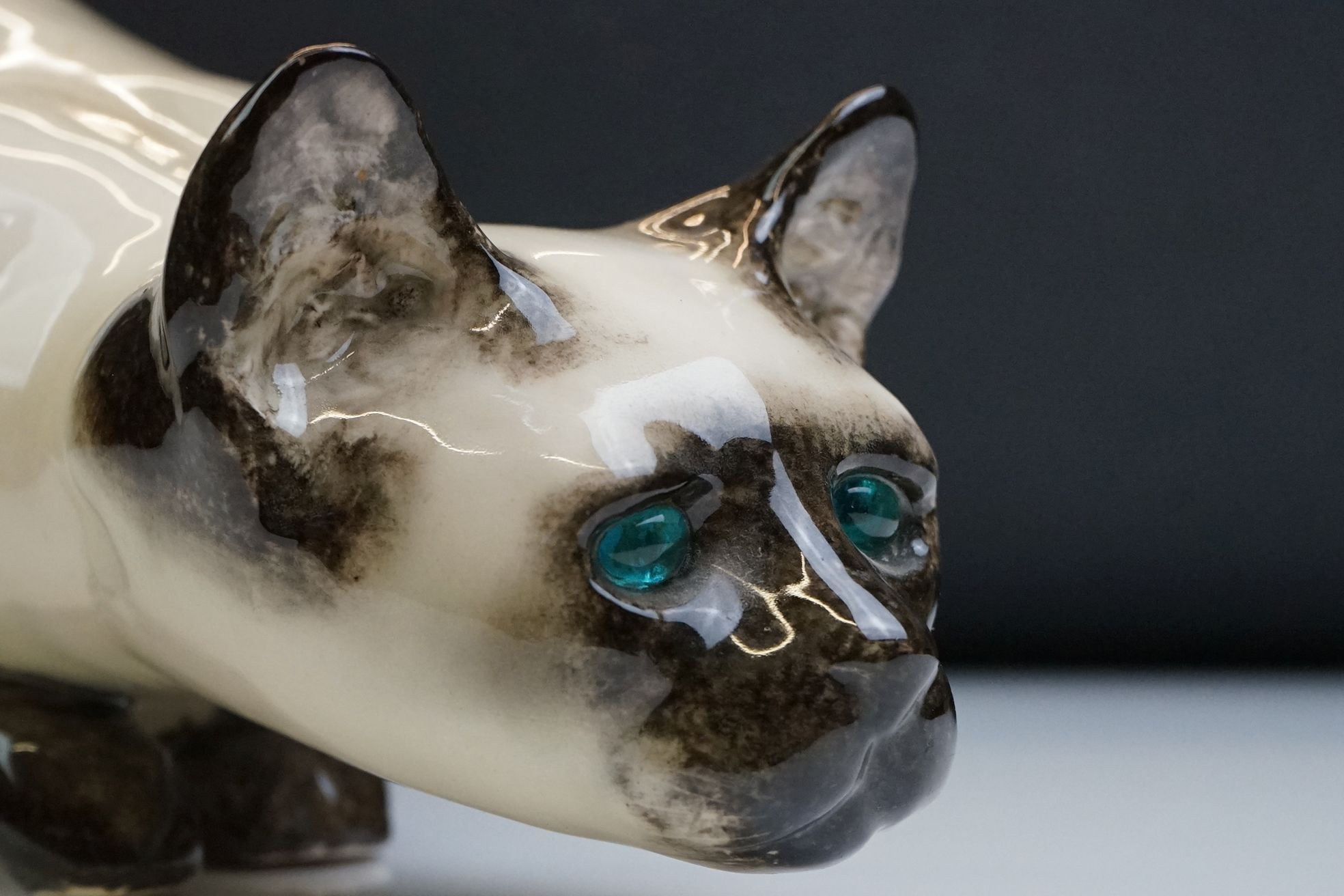Winstanley pottery figure of a crouching Siamese cat with blue glass eyes, signed to the base and - Image 14 of 14