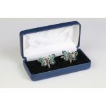 Cased pair of silver butterfly cufflinks set with ruby cabochons
