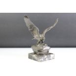 Bronze effect Metal Eagle on a Rock mounted on a marble base, 24cm high together with a Brass
