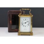 A brass cased carriage clock with bevelled glass panels, the dial marked Hawley & Co of Regent St.