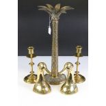 A small group of mixed brass ware to include a pair of candle sticks, a large candlestick in the