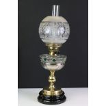 Victorian Oil Lamp with etched glass globular shade, clear and green glass well, brass column and