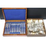 A collection of mixed silver plated cutlery to include a canteen of fish knives and forks.