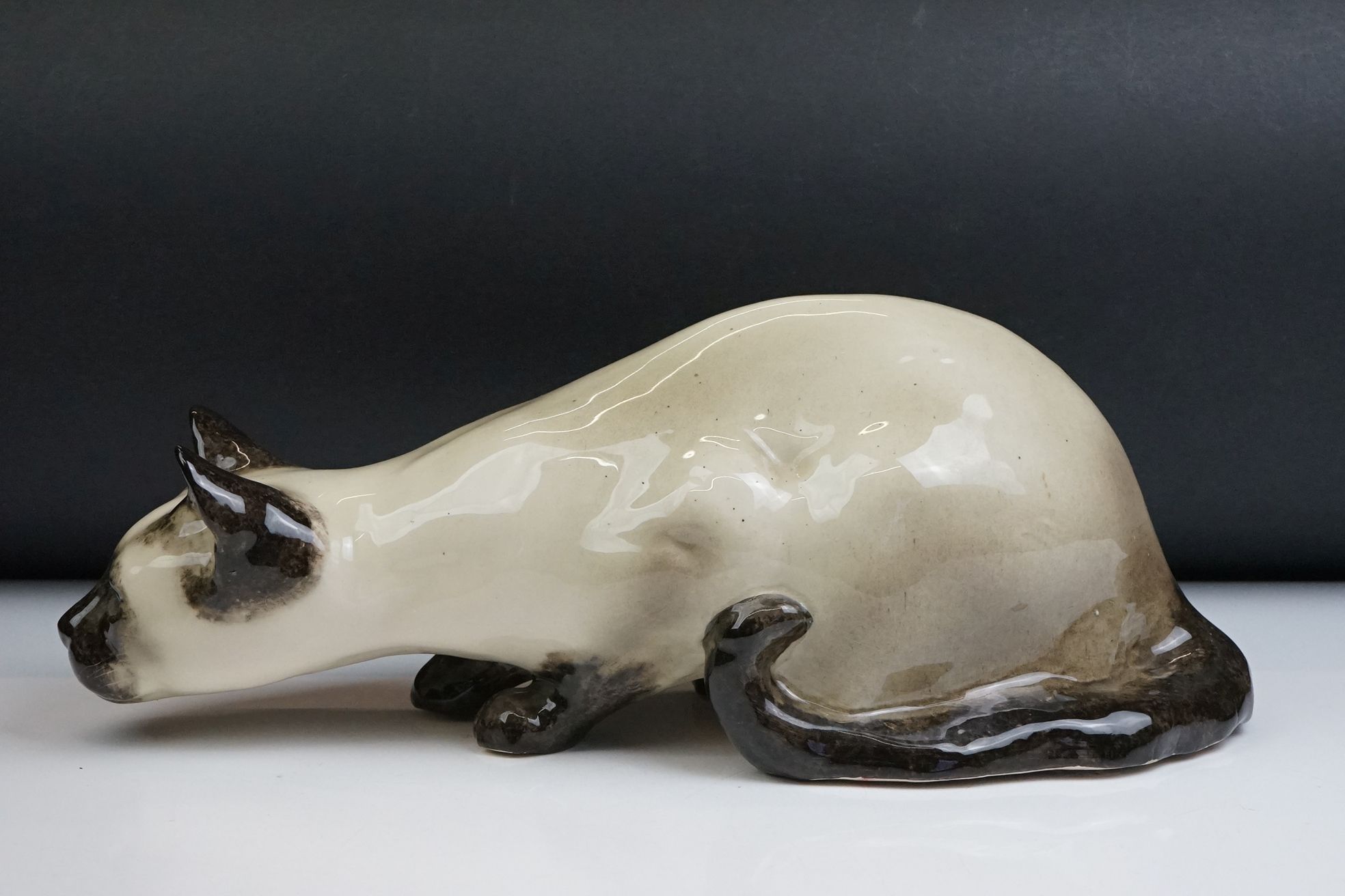 Winstanley pottery figure of a crouching Siamese cat with blue glass eyes, signed to the base and - Image 3 of 14