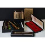 A collection of mixed pens to include Parker fountain pens together with vintage money boxes and