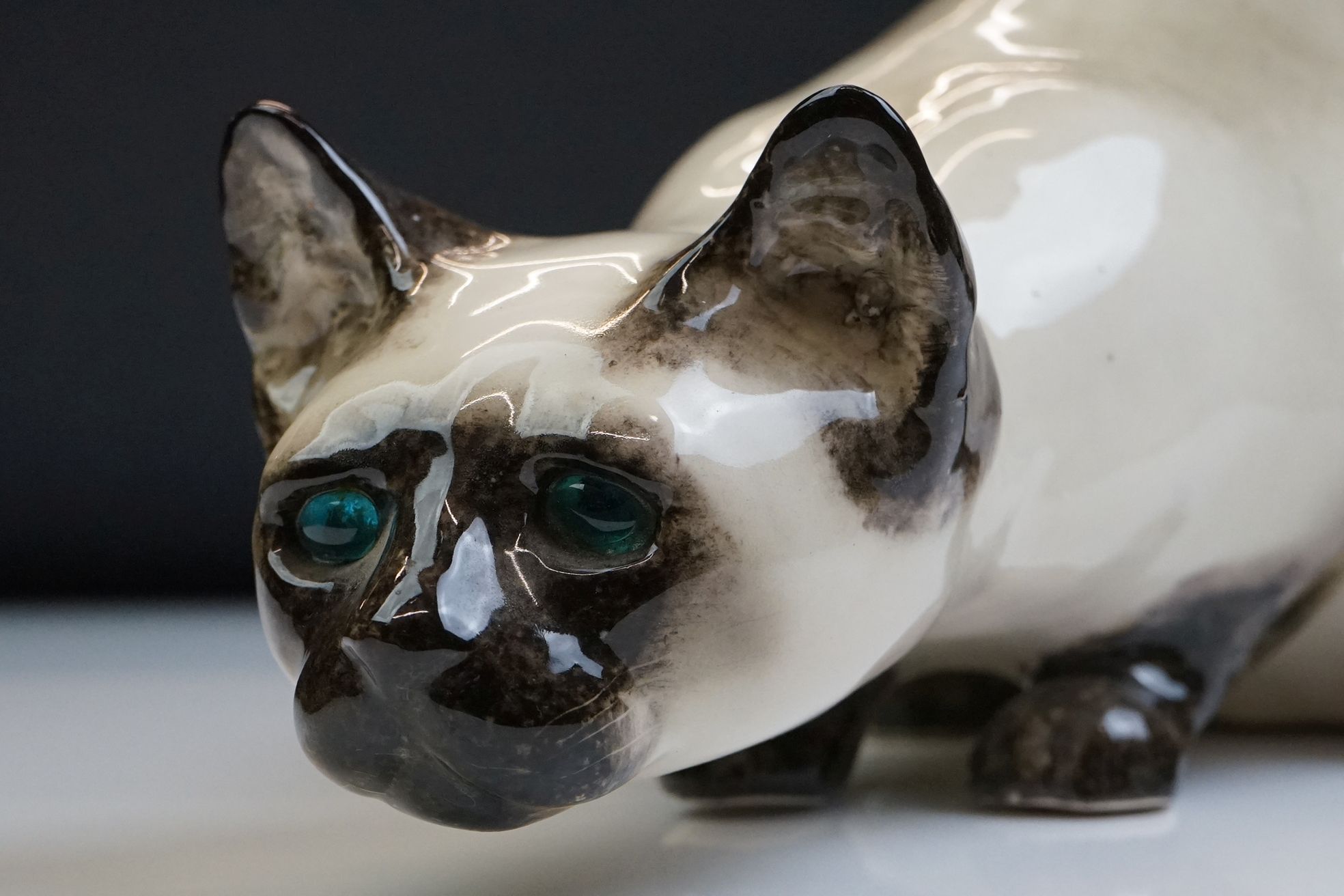 Winstanley pottery figure of a crouching Siamese cat with blue glass eyes, signed to the base and - Image 13 of 14