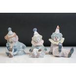 Three Lladro porcelain clown figures to include 5277 Pierrot With Puppy, 5812 Tired Friend and