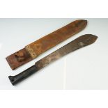 A British military issued World War Two machete with leather scabbard, dated 1944 and broad arrow