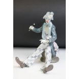 Lladro ' Checking The Time ' porcelain clown figure, model no. 5762, 24cm tall