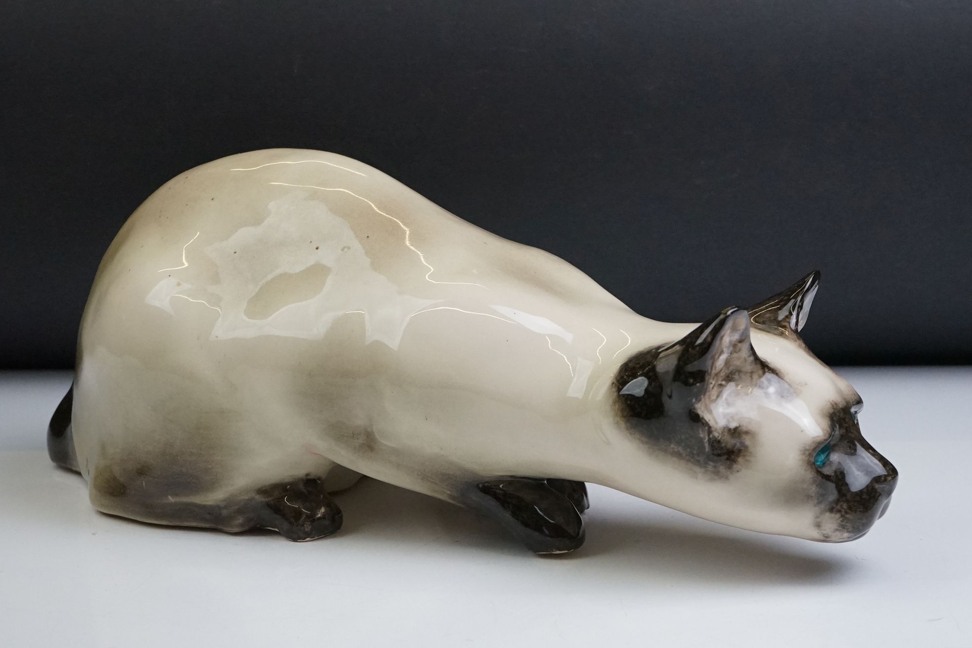 Winstanley pottery figure of a crouching Siamese cat with blue glass eyes, signed to the base and - Image 4 of 14