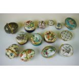 A collection of approx fourteen enamel trinket boxes to include Halcyon Days examples.