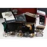 A box of mixed collectables to include coins, silver plated toast racks, Royal Mint coin sets,