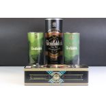 A collection of four boxed bottles of Glenfiddich whisky.