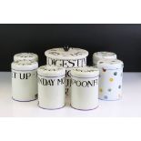 A collection of six Emma Bridgewater tin storage jars together with a biscuit barrel.