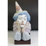 Lladro Jester bust figure, model no. 5129, 30.5cm high, raised on a wooden base