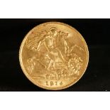 A United Kingdom King George V gold half sovereign coin dated 1914.