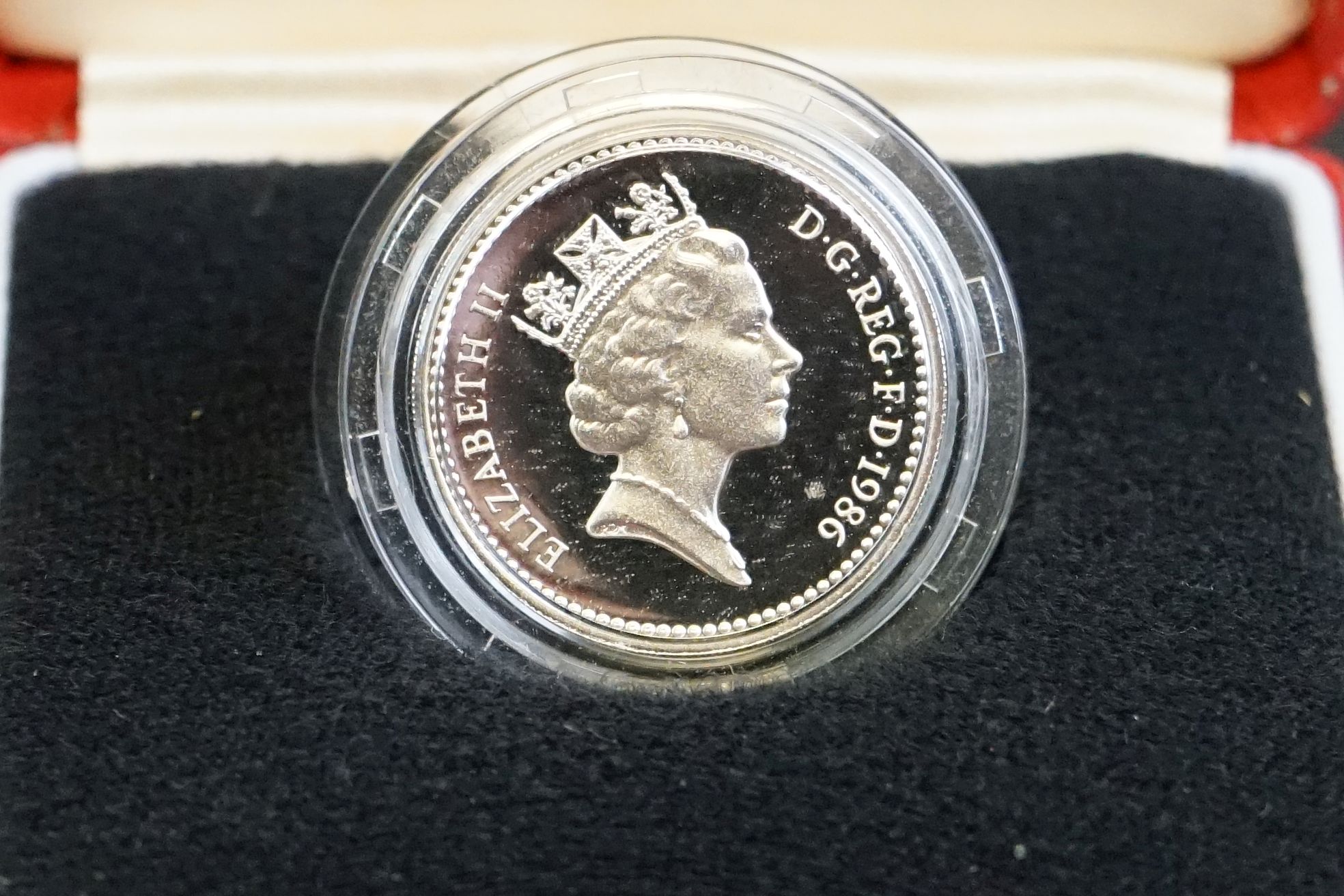 A collection of four Royal Mint United Kingdom silver proof £1 / one pound coins to include 1986, - Image 3 of 10