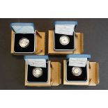 A collection of four Royal Mint United Kingdom silver proof £1 / one pound coins to include 1998,