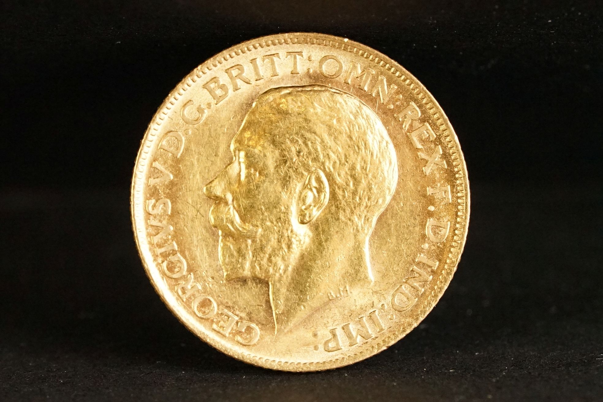 A United Kingdom King George V gold full sovereign coin dated 1911. - Image 2 of 3