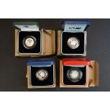 A collection of four Royal Mint United Kingdom silver proof coins to include two 1986 Commonwealth