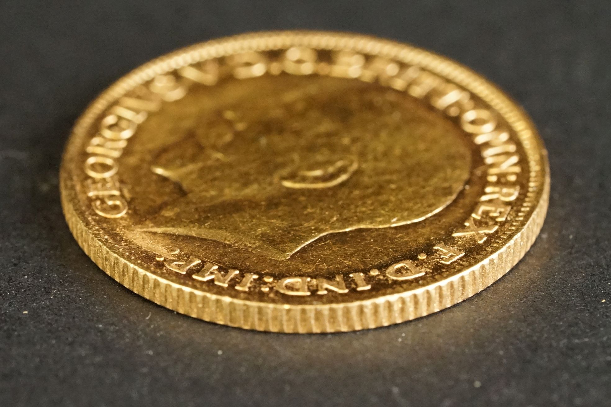 A United Kingdom King George V gold full sovereign coin dated 1911. - Image 3 of 3