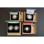 A collection of four Royal Mint United Kingdom silver proof 50p / fifty pence coins to include