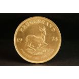 A South Africa gold 1oz full Krugerrand coin dated 1974.